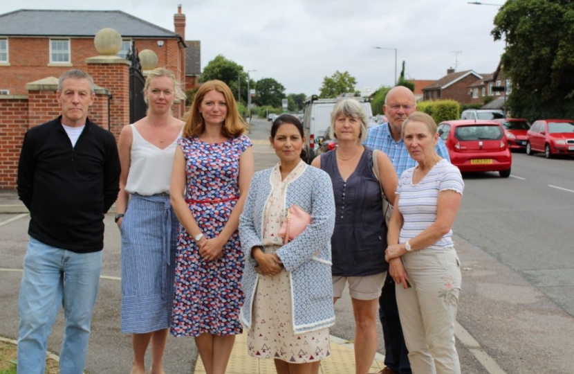 Priti Patel MP (front) with concerned local residents in Copford assessing the nuisance car parking problem. Cllr Janet Maclean, CBC Ward Councillor and Cllr Graham Barney, Chairman of Copford with Easthorpe Parish Council are in the back row, right.